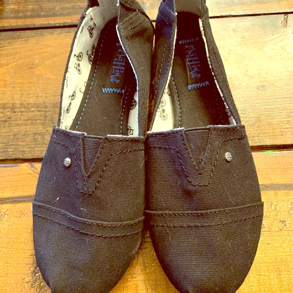 Black slip ons. Brand new, never worn.